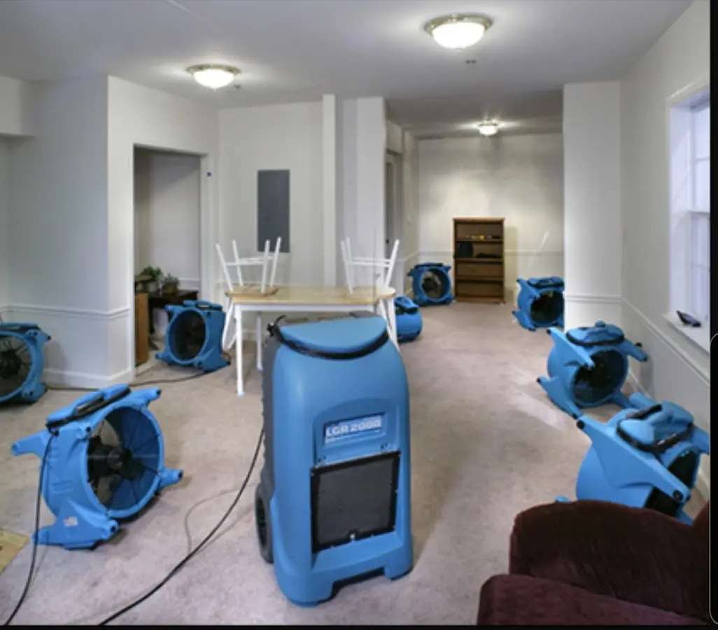 Air movers and dehumidifier setup for Water Damage Restoration in Royalton